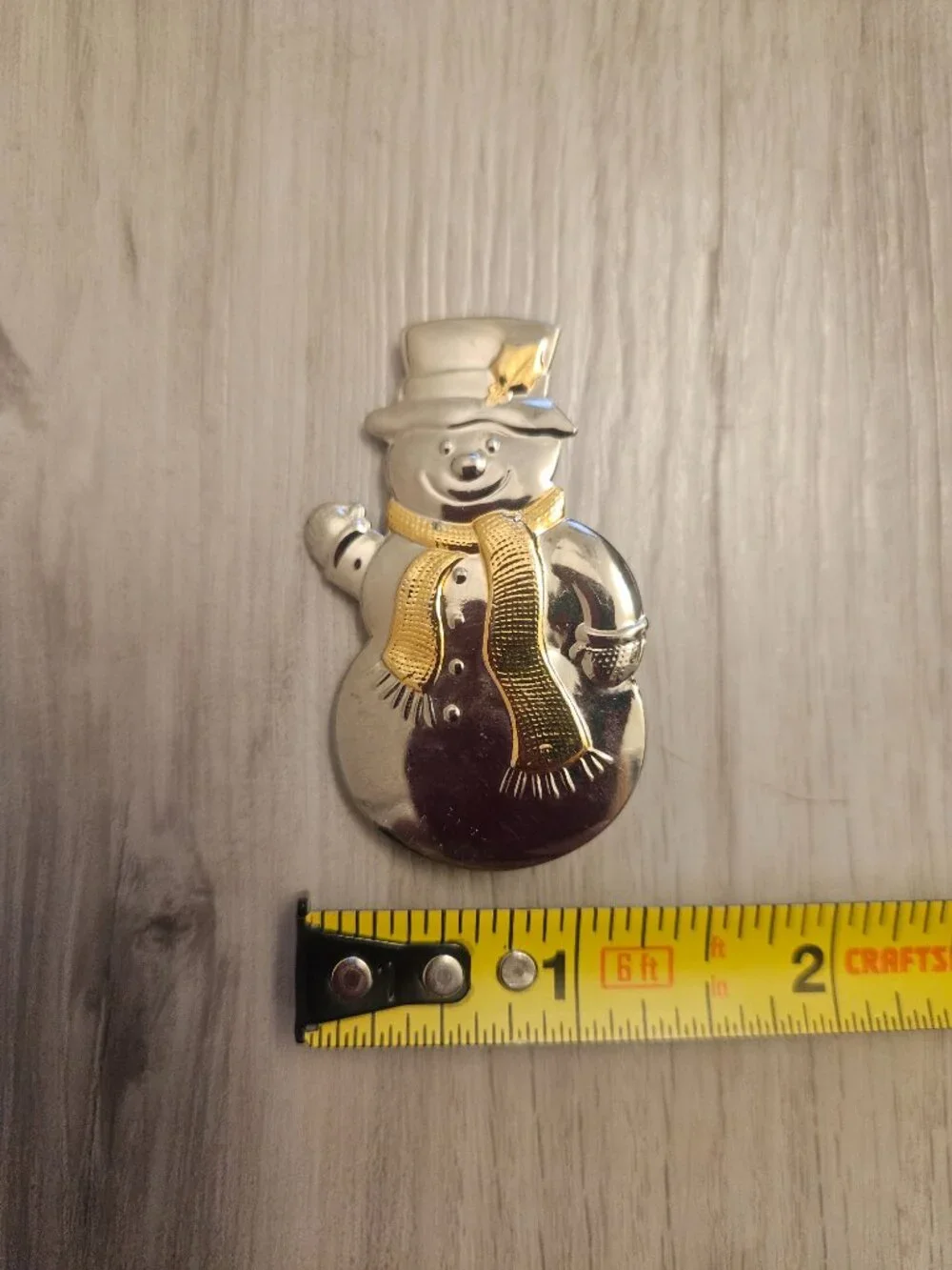 Vintage Hallmark Christmas two-tone gold and silver-plated snowman Brooch